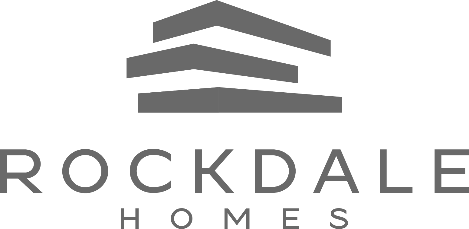 The logo of Rockdale Homes in Greyscale for presenting In a gallery.